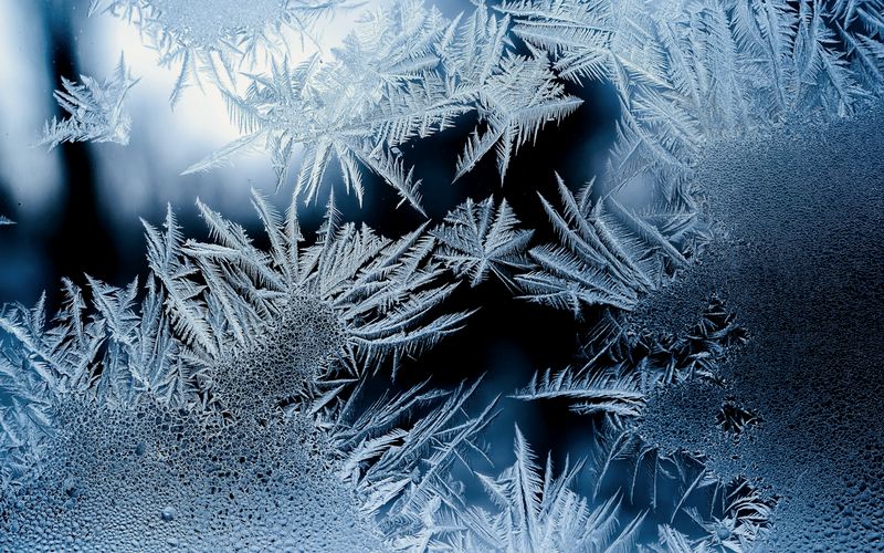 a close up of a frosty window
