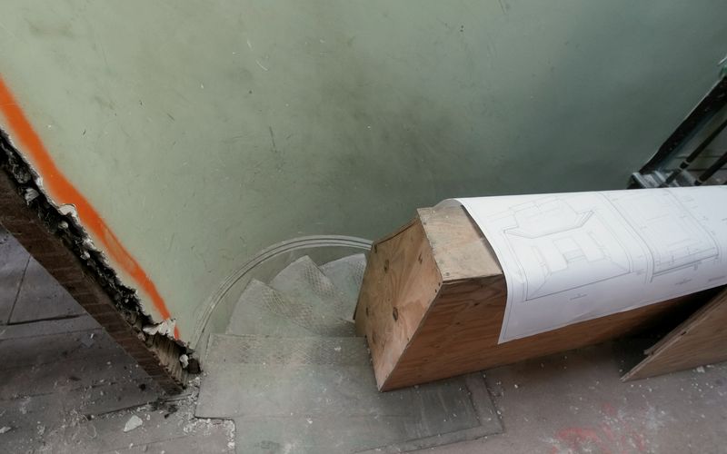 Construction materials and debris on a floor