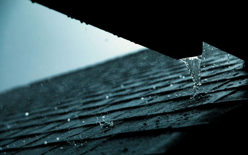 a close up of a rain gutter on a roof