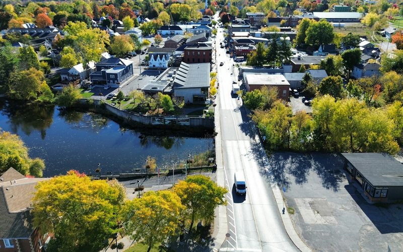 Aerial view of a small town with autumn foliage
